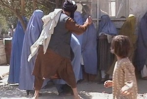 Taliban beat a woman in Kabul Sep.2001