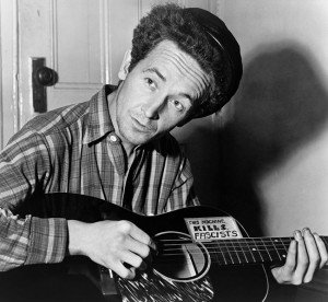 650px-Woody_Guthrie_2-300x276[1]