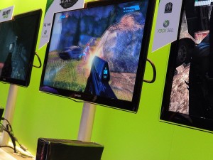 A man samples games on the XBOX 360 at t