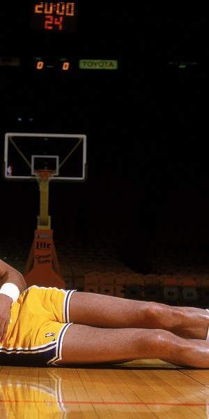 Undated: Kareem Abdul- Jabbar of the Los Angeles Lakers poses for the camera as he lays on the court.  Mandatory Credit: Rick Stewart  /Allsport
