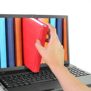 book-on-laptop