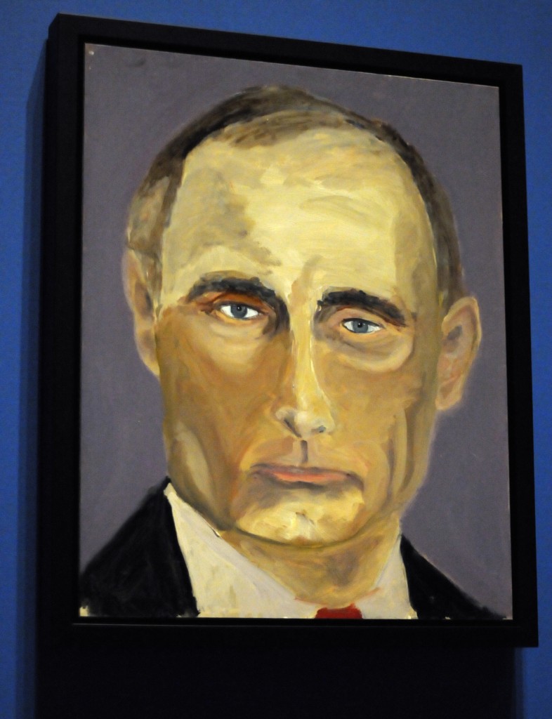 A portrait of Russian President Vladimir Putin which is part of the exhibit "The Art of Leadership: A President's Diplomacy," is on display at the George W. Bush Presidential Library and Museum in Dallas, Friday, April 4, 2014. The exhibit of portraits of world leaders painted by former President George W. Bush opens Saturday and runs through June 3. (AP Photo/Benny Snyder)