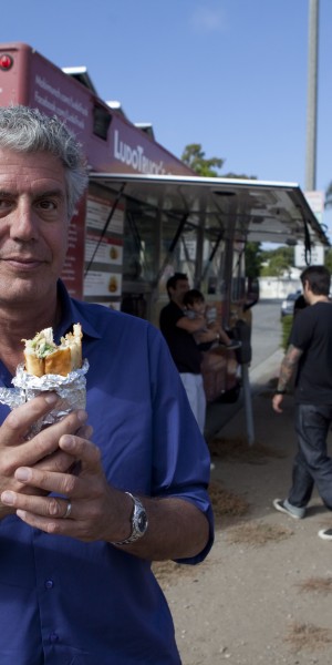 SANTA MONICA, CALIFORNIA, AUGUST 07 2011: Layover host Anthony Bourdain at the fried achicken at Ludo Truck's Guerilla Chicken, a fried chicken food truck trendy with foodies and started by renowed French chef Ludo Levfvre (photo Gilles Mingasson for The Travel Channel).