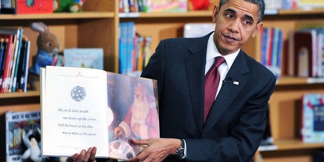ARLINGTON, VA - DECEMBER 17:  U.S. President Barack Obama reads a book to about 90 second graders at Long Branch Elementary School December 17, 2010 in Arlington, Virginia. Obama is expected to sign the compromise $858 billion tax legislation later in the day.   (Photo by Olivier Douliery-Pool/Getty Images)