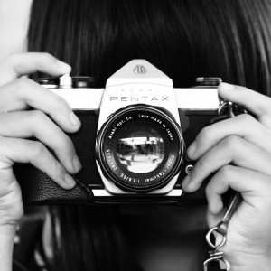 woman-holding-dslr-camera-in-grayscale-photography-3