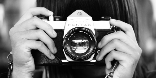 woman-holding-dslr-camera-in-grayscale-photography-3