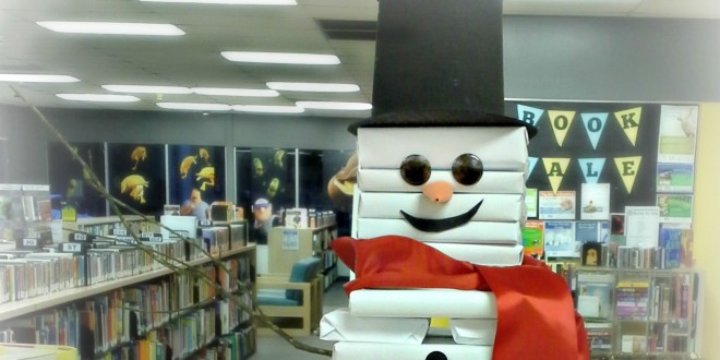 a-book-snowman-winter-library-display-library-snowman-christmas-book-display