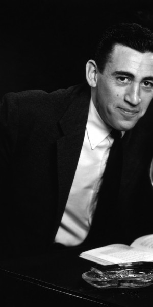 NEW YORK - NOVEMBER 20, 1952: *** EXCLUSIVE - CALL FOR IMAGE *** JD Salinger poses for a portrait as he reads from his classic American novel "The Catcher in the Rye" on November 20, 1952 in the Brooklyn borough of New York City. Salinger died on January 27, 2010. (Photo by Antony Di Gesu/San Diego Historical Society/Hulton Archive Collection/Getty Images)